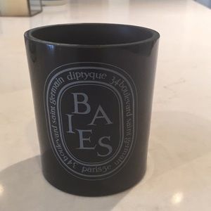 One Diptyque Baies candle container